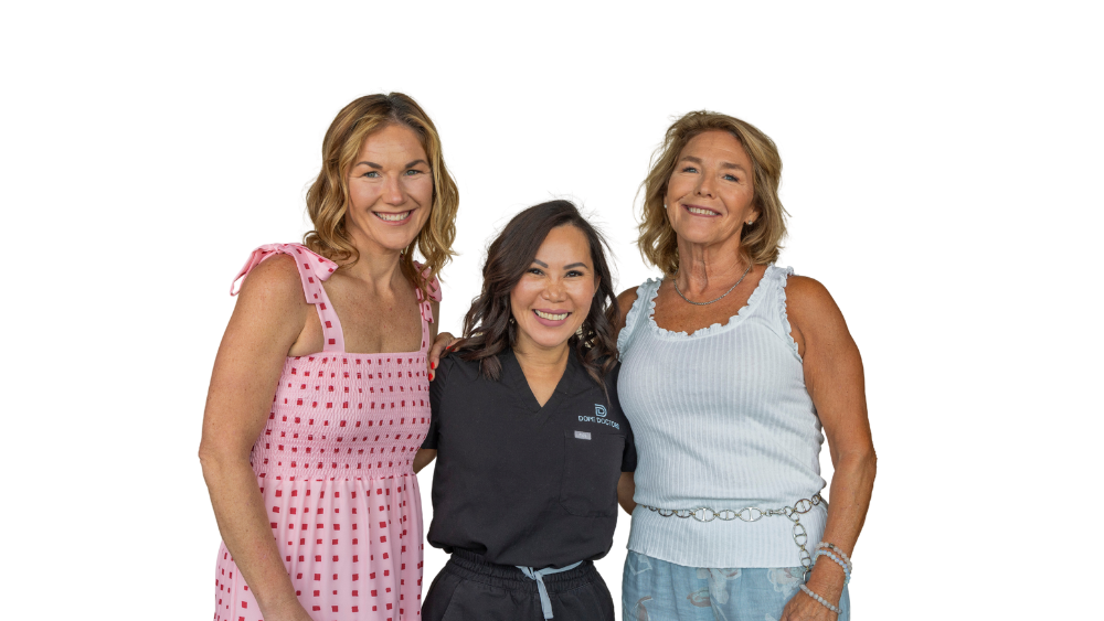 3 happy woman standing shoulder to shoulder